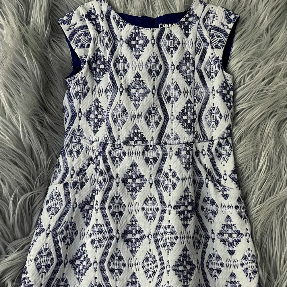 Navy blue white and silver dress size 4.